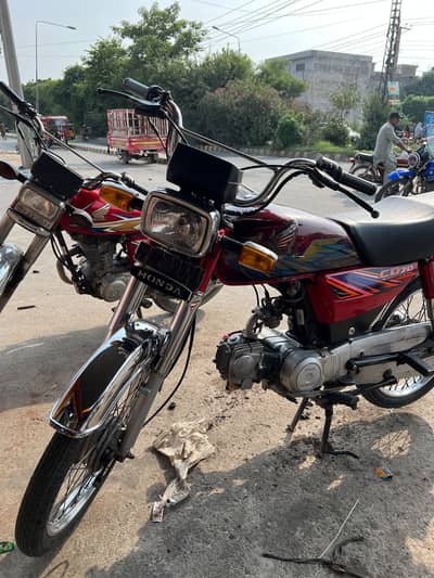 Honda CD 70 Red Color – Excellent Condition – Genuine Bike