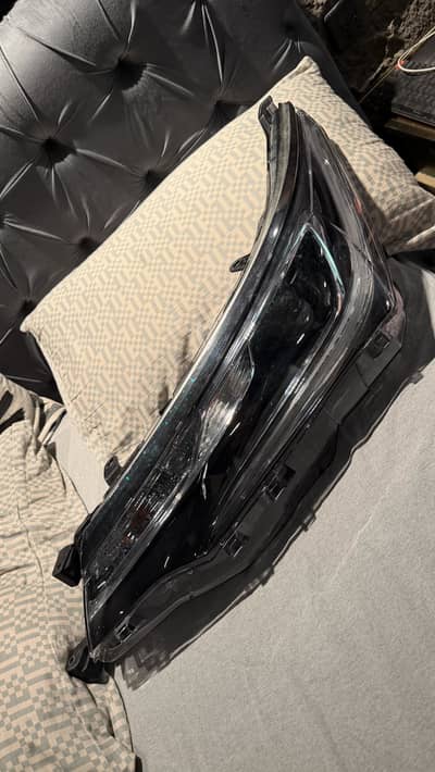 Corolla Grande Genuine LEFT side Headlight (glass repaired)
