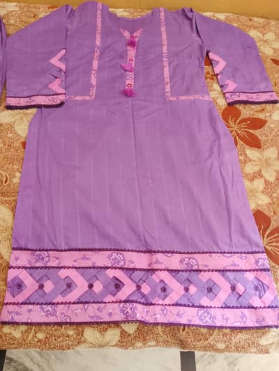 Lawn dress kurta and plazo with handbag but without dupatta.