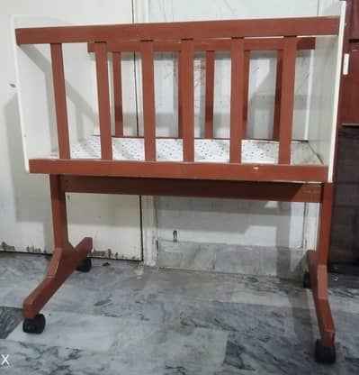 Slighly used wooden Baby Cot / Swing