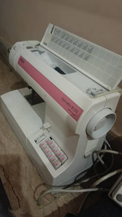 Sewing machine for sale