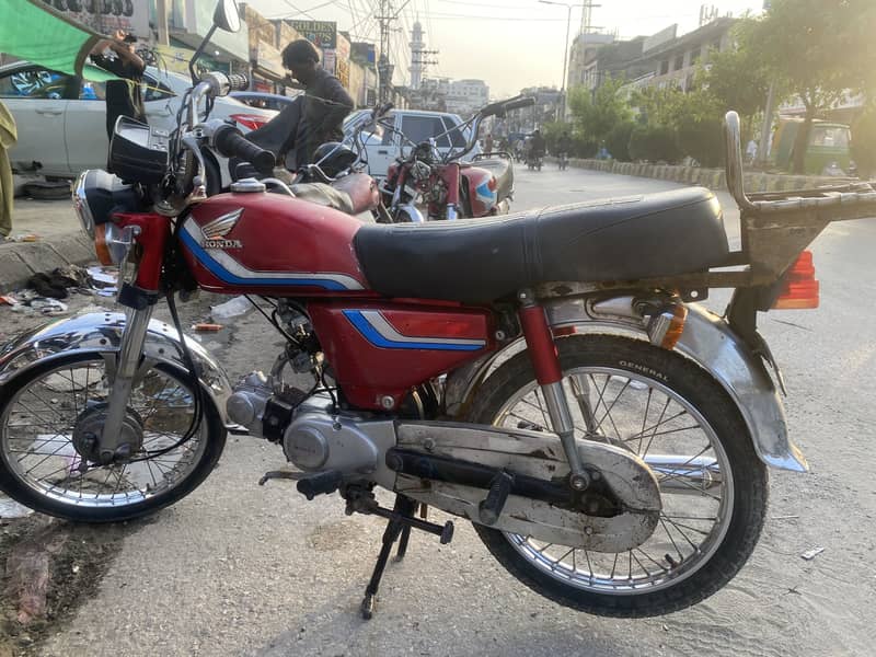 Honda 70 pointer 1