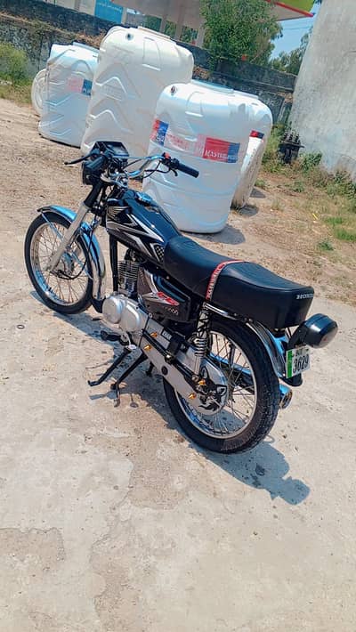 Honda 125 2016 model All Punjab nomber 10 by 10 file letter available