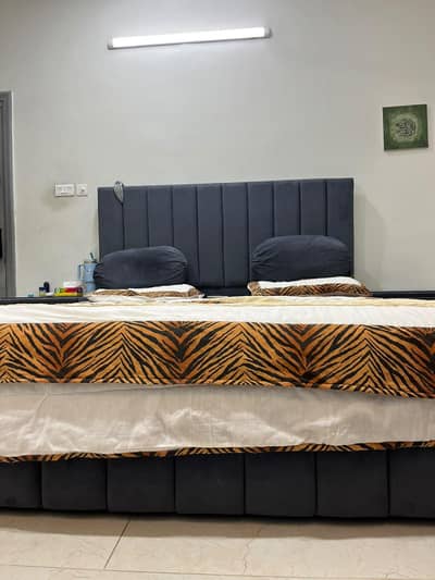 velvet king size bed with side tables