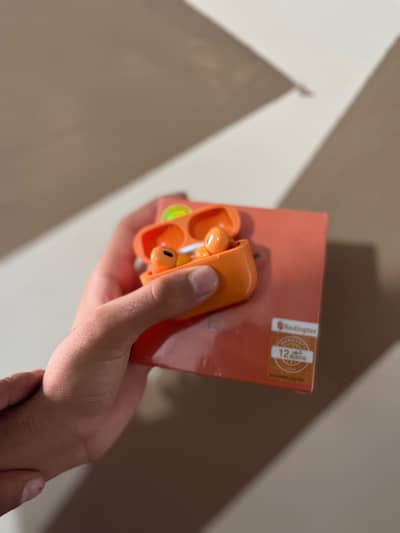 Airpods pro 2 orange clr box pack  best sound quality quantity avail