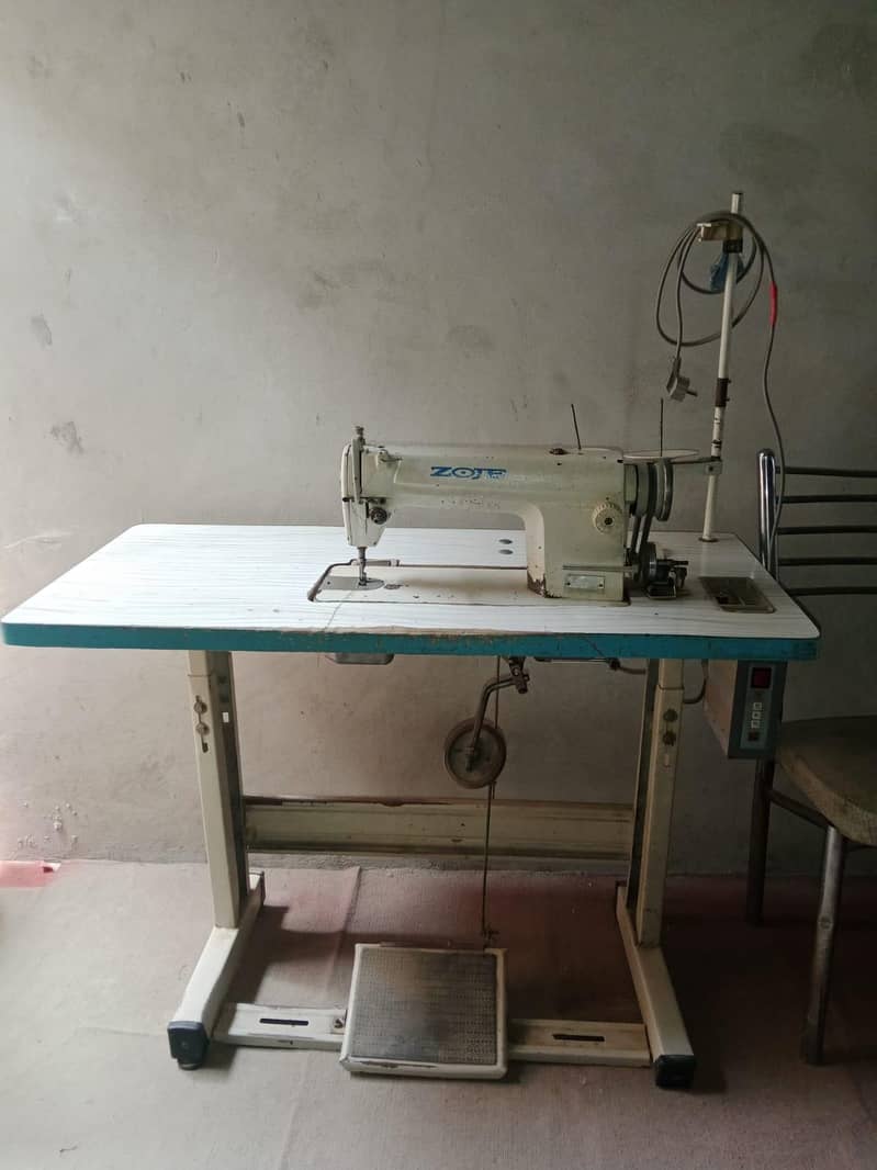 sewing machine 12