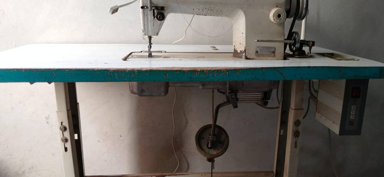 sewing machine 14