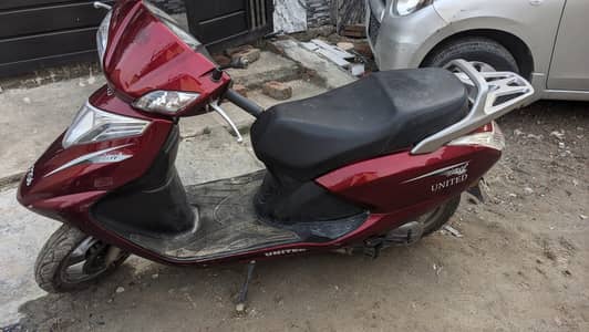 united 100 cc scooty