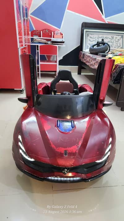 KIDS ELECTRIC RIDE-ON SPORTS CAR FOR SALE