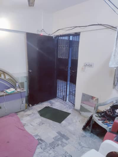 ground floor portion 2bed dd block 4 johar near Kamran chowrangi