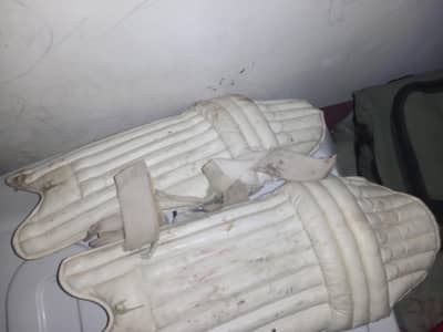 Pads and halment of hard ball