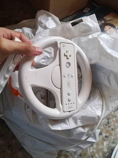 Nintendo Wii consoles (3 consule) with controller