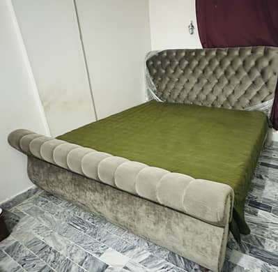Stylish velvet bed with a comfortable spring mattress new