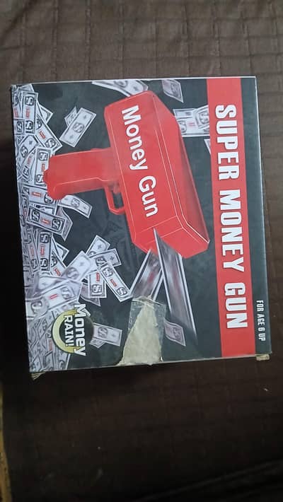 Red Super Money Gun – Works Great (Batteries Not Included)