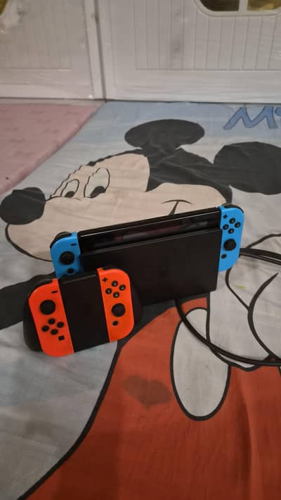 Nintendo switch 1 with 2 pairs of controllers