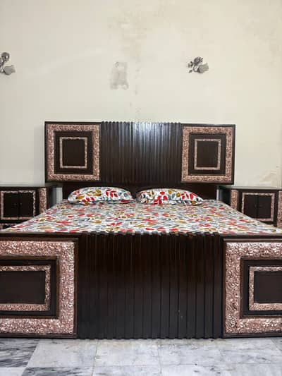 king bed with mattress and side table