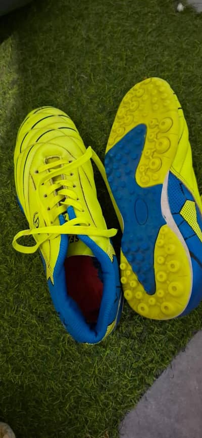 An slightly used football grippers in 10/10 conditions