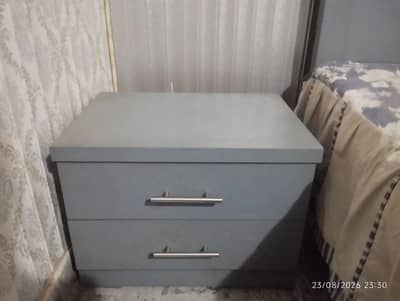 king size bed with side table