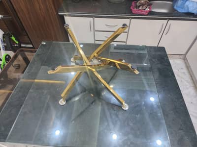 Glass table with golden lags