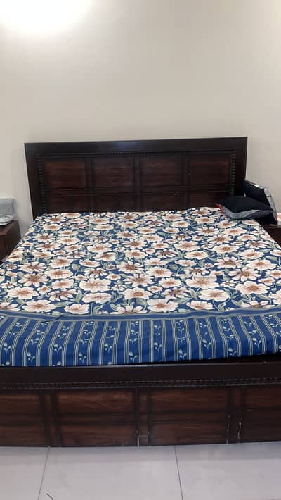Bed with side tables