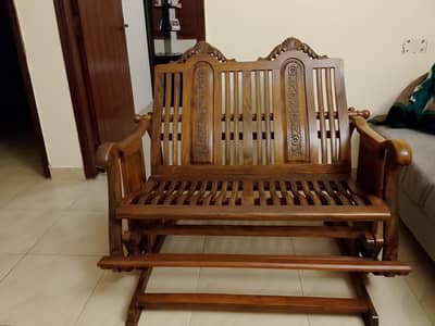 Walnut wood Rocking chair in brand new condition.