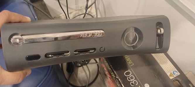 Xbox with controller and box with cables