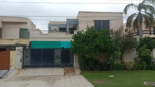 One Kanal Used Modern Design Owner Build 6-Bedroom Full Basement Bungalow For Sale At Prime Location Of DHA Lahore Near To Park Masjid & Commercial Market