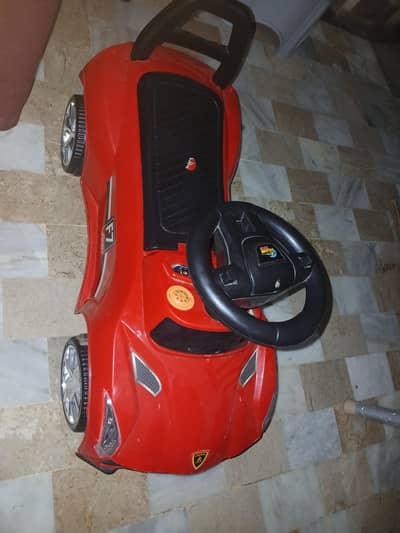 2 Kids Ride On Push Cars - Red 3500 & White Green - 3000 /