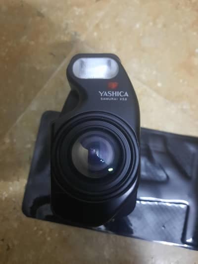 YASHICA SAMURAI X3.0 SLR CAMERA SAME LIKE NEW. CONTACYMT. 03128000671