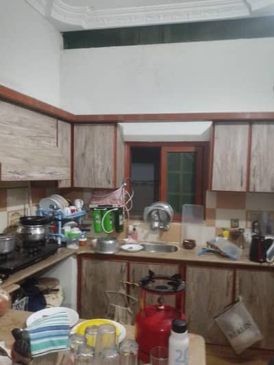 ground floor portion 2bed dd block 4 johar near Kamran chowrangi