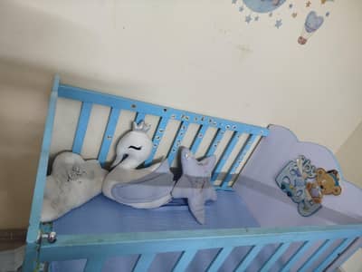 baby wooden cot.
