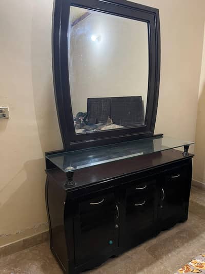 dark brown wooden dressing table