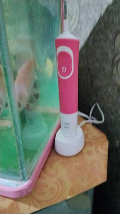 braun oral b electric toothbrush machine with charger