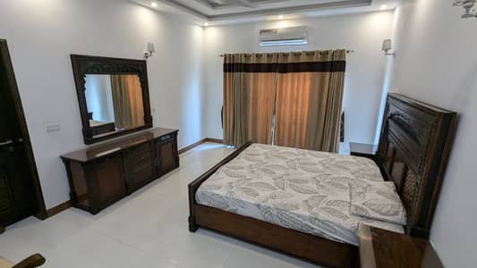 1 Kanal Fully Furnished 5 Bedrooms House With 3 Servant Quarters Full Basement FOR RENT In Phase 4 DHA Lahore