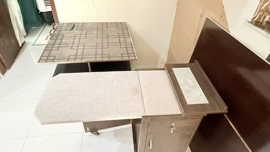 Space saving iron table available