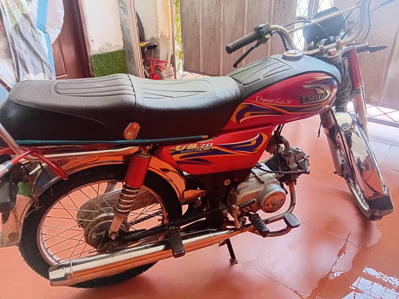 united 70cc 9