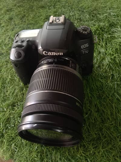canon 77d body with 18-200 lense