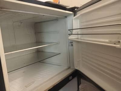 Dawlance Red mosquito repellent medium size fridge for sale
