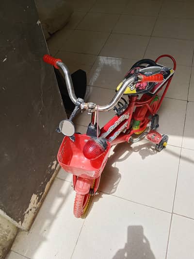 kids bicycle in red multiple colors just like a new