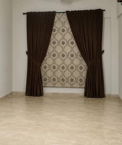 imported brown curtains with a blinder