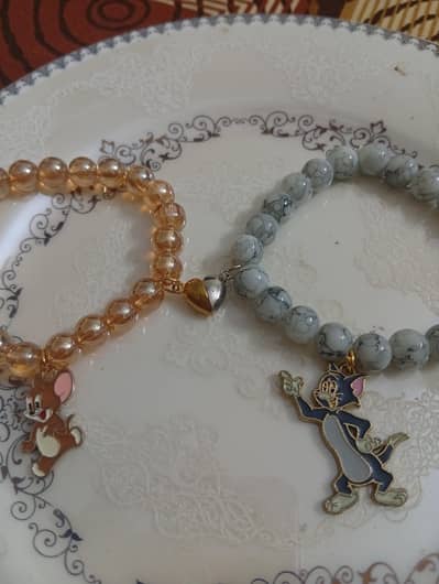 Tom & Jerry bracelet pair with magnetic heart