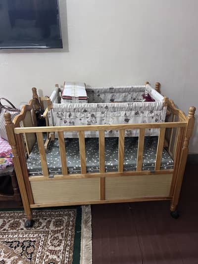 Wooden baby cot and swing