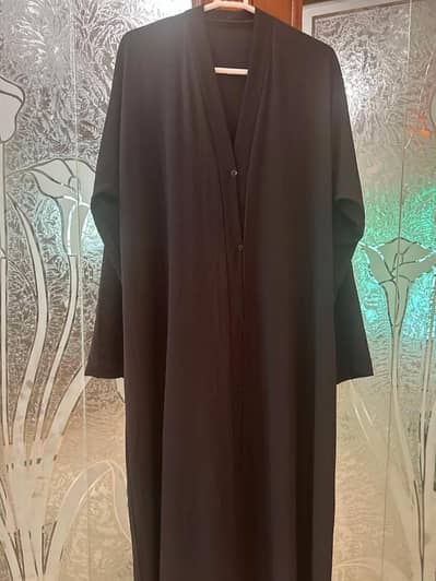 A black beauty abaya for elegance and style , simple yet iconic.