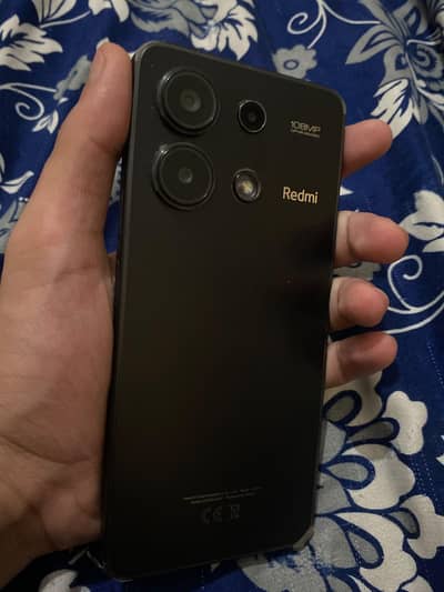 Xiaomi Redmi Note 13 available in good condition for sale.