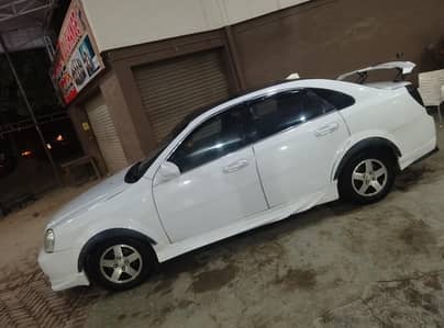 Chevrolet Optra 2008 custom body kits and upgraded wheels,