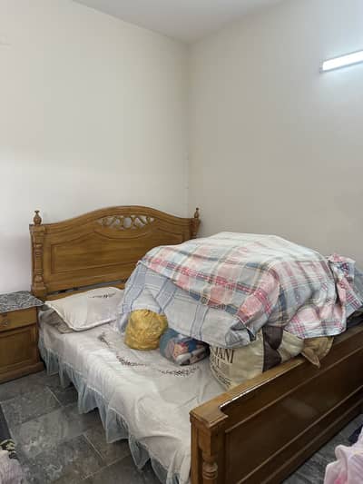 Queen size double bed with 2 side tables