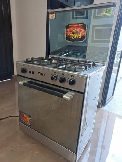 Look Brand New Electric/Gas 3 Burners and Gas Oven