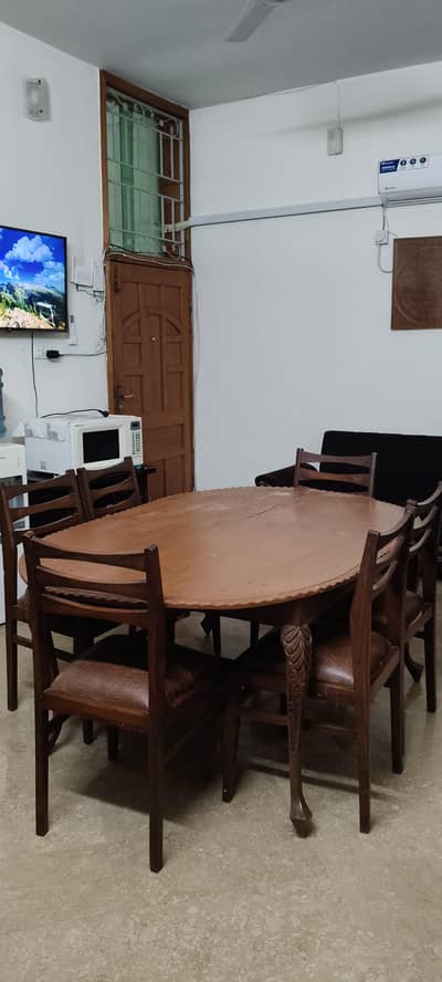 Pure Walnut Wood Dining Table with 6 Chairs – Rs. 50,000