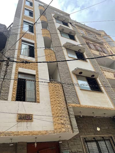 Karachi Defence Dha Near Akhter colony 90 yards brand new building for sale