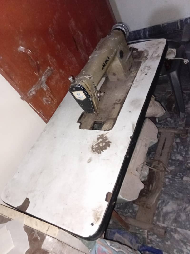 a sewing machine 6